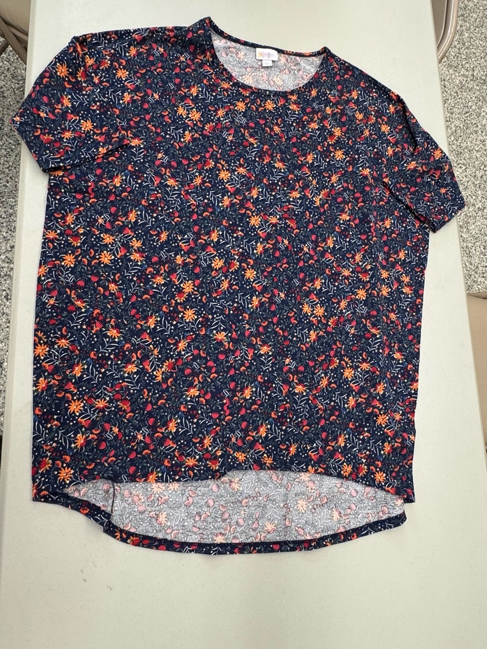 LuLaRoe Navy Floral Short Sleeve Irma Tunic Top with Orange & Pink Blooms